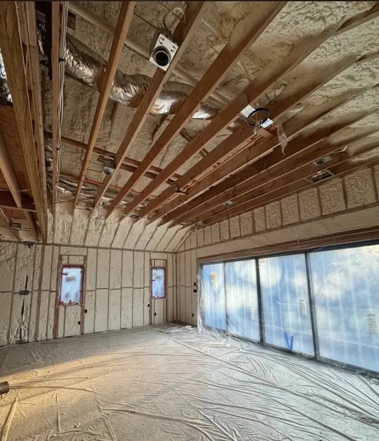 Interior walls and ceiling insulated with spray foam during new construction in Hatfield